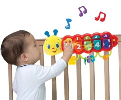 Lira Baby, con luces y música, hilandero y anillos, oruga musical Foto 1 de 4