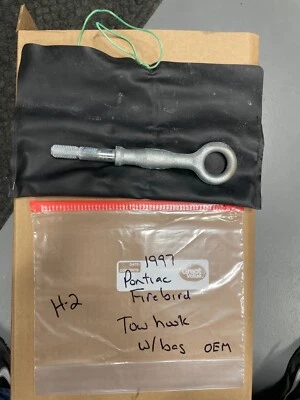 Pontiac Firebird 1997 - Gancho de remolque OEM ojo perno tornillo tirador con bolsa Foto 1 de 4