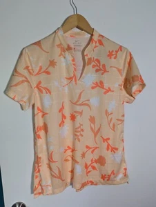 NWT WOMEN'S NIKE DRI-FIT POLO, SIZE: XS, COLOR: ORANGE FLORAL (J538) - Picture 1 of 3