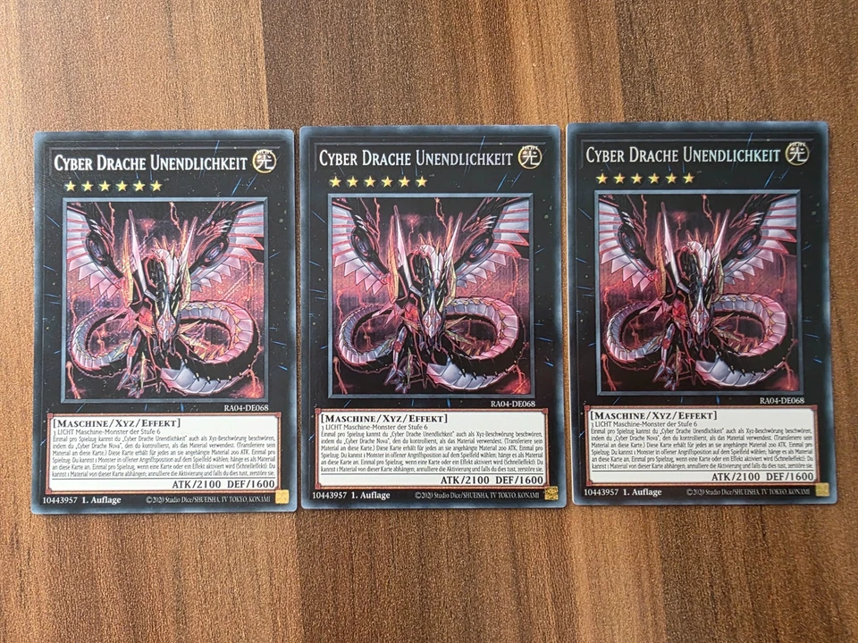 3x Yu-Gi-Oh! RA04-DE068 Cyber Drache Unendlichkeit Secret Rare NM 1st - Bild 1 von 1