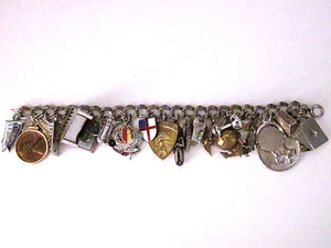 Vintage 60er Jahre Bettelarmband mit 27 Charms,21 sind Sterling,5 Messing,1 Kupfer - Bild 1 von 12