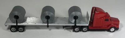 Remolque de plataforma plana Ertl 1/64 diecast Freightliner semirremolque con bobina de acero carga Foto 1 de 4