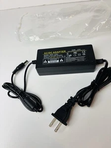 AC/DC Adapter Model:1203 Switching Power Adapter - Picture 1 of 7