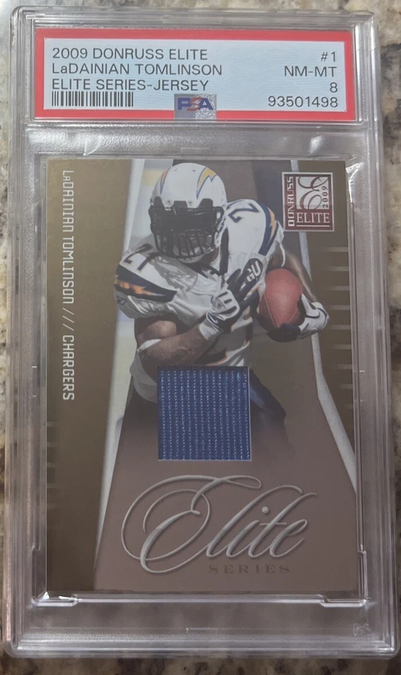 2009 Donruss Elite LaDainian Tomlinson Game Worn Powder Blue /299 PSA 8 Pop 3/0^ - Image 1 of 4