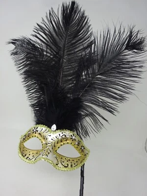 LADIES BLACK & GOLD VENETIAN MASQUERADE PARTY FEATHER MASK ON A HAND HELD STICK - Image 1 of 4