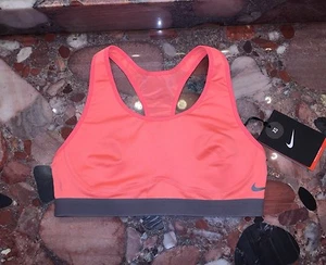 Reggiseno sportivo nuovo con etichette $50 Nike Dri-Fit arancione supporto medio impatto allenamento donna XS - Foto 1 di 3