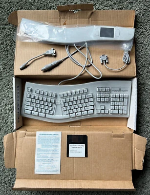 NOS VINTAGE KB-7903 ERGONOMIC KEYBOARD w BUILT-IN TOUCH PAD WINDOWS COMPATIBLE - Image 1 of 4