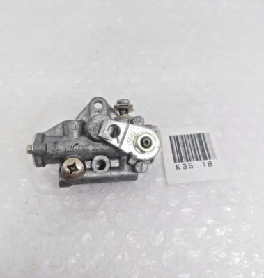 Suzuki GP100 GP125 DS100 DS125 TS100 TS125 Oil Pump Assy NOS P/N 16100-48020 - Image 1 of 4