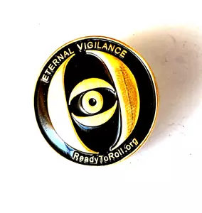 Prendedor Listo Para Rodar Org Vigilancia Eterna Antiterrorismo Tono Negro y Dorado - Imagen 1 de 1
