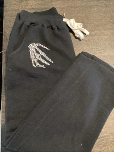 SUDADERAS NEGRAS BEAMLIGHT CON ESQUELETO MANOS EN BOLSILLOS TALLA MED - Imagen 1 de 10