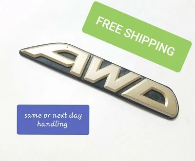 SUBARU OUTBACK AWD REAR HATCH EMBLEM OEM "AWD" TRUNK DECKLID LIFTGATE GATE GOLD - Image 1 of 4