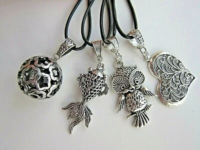 Collar de cordón largo en forma de corazón de filigrana u otros colgantes de cuero genuino. Foto 1 de 4