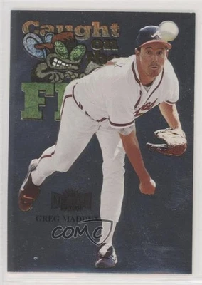 1999 Skybox Metal Universe Caught on the Fly Greg Maddux #243 HOF - Image 1 of 2