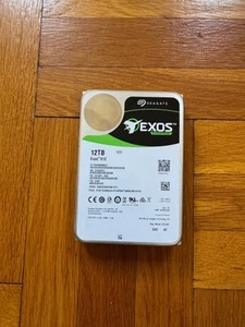 Seagate Exos X12, ST12000NM0027, 12TB SAS drive used - Photo 1/3
