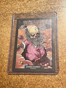 1991 Brockum RockCards Pushead Sandra Kuwait - Picture 1 of 2