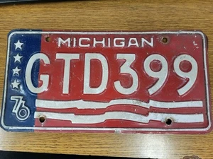 Targa Michigan 76 GTD399 - Foto 1 di 1