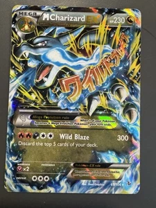 M Charizard EX (X) 69/106 Flashfire Holo - Picture 1 of 9