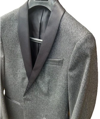 Chaqueta de esmoquin ajustada para niños talla S - negra con manchas plateadas. Solapa de chal, Elvis, llamativo Foto 1 de 4