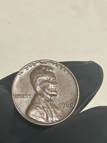1968 Lincoln Penny with Error on Top Rim Cover