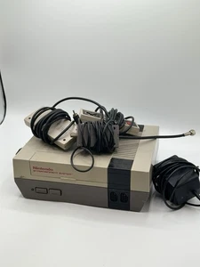 Nintendo NES-001 Console Bundle – 2 Controllers + RF Adapter – Tested & Working - Picture 1 of 4
