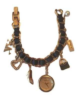 Reloj pulsera Anne Klein cinta negra eslabones dorado 7 dijes Foto 1 de 4