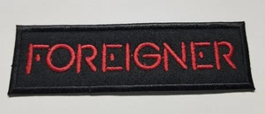 Foreigner Band Embroidered red Patch approx. 1.25x4.25" - Picture 1 of 2