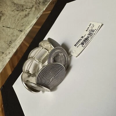 Pulsera elástica gruesa para mujer Dana Buchman tono plata 7 pulgadas $28 Foto 1 de 4