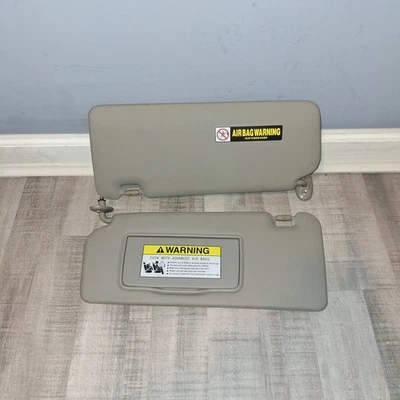 07-08 OEM Honda FIT Par de parasoles lado del conductor pasajero vinilo gris Foto 1 de 3