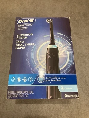 Cepillo de dientes recargable Oral-B Smart 5000 superior limpio Bluetooth negro - usado Foto 1 de 4