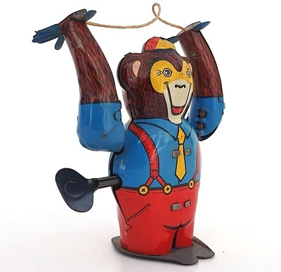 SINGE ACROBATE PIROUETTE AVEC CORDE À SAUTER   ANCIEN JOUET MÉCANIQUE FONCTIONNE - Photo 1/4