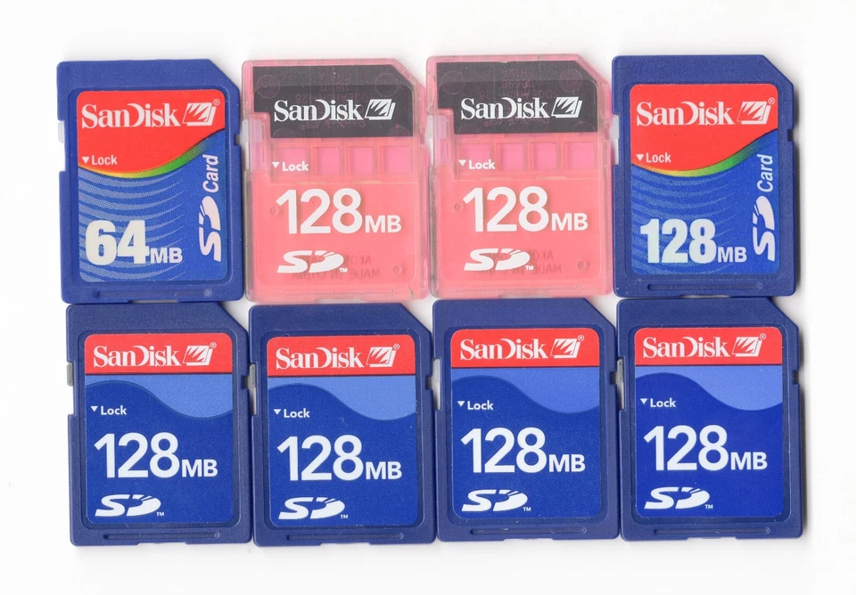 Lot Of 8x SanDisk 64MB / 128MB MEGABYTE SD Camera Memory Cards - Image 1 of 1