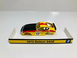 AUTO-WORLD X-TRACTION~ 1973 " DATSUN 240Z " CORPO ~ AURORA AFX ~ NUOVO ~ ULTIMO - Foto 1 di 8