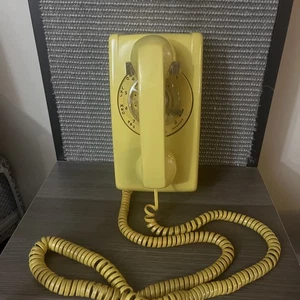 Telefono da parete rotante giallo vintage sistema a campana telefono quadrante elettrico occidentale - Foto 1 di 6