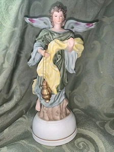 "Escultura de porcelana Milano de 9 1/4"" de Eda Mann Angel caja de música vintage 1982" - Imagen 1 de 7