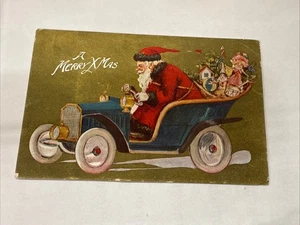 Christmas Santa Claus Driving Car Toys Gold Gilt c1900s Vintage Postcard - Picture 1 of 2