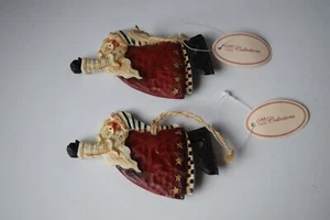 coppia di Babbo Natale volanti in legno con etichette - Foto 1 di 7