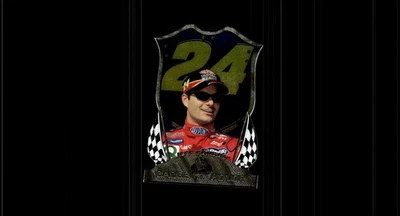 1999 Press Pass Badge of Honor Die Cut Jeff Gordon  #BH10 - Image 1 of 2