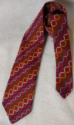 Corbata de seda Ben plateada con patrón geométrico - diseño a cuadros rojo, amarillo, azul Foto 1 de 4