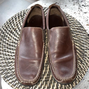 Zapatos informales sin cordones Cole Haan Tucker Venetian para hombre 10,5 M cuero marrón - Imagen 1 de 8