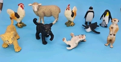 Lote de 10 figuras de animales Schleich Safari Ltd suricata emperador pingüino Foto 1 de 4