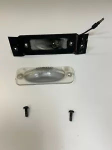 1970-1974 MOPAR E-BODY REAR LICENSE PLATE LIGHT P/N 2483297 - Picture 1 of 5