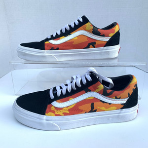 orange vans on feet