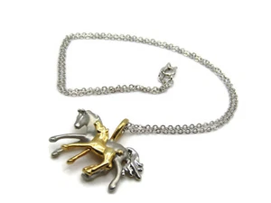 Collana con ciondolo madre e vitello cavallo tono argento e oro - Foto 1 di 4