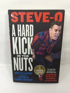 [SIGNED] A Hard Kick In The Nuts - Steve-O - (2022,HC,1st/1st)  - Bild 1 von 5