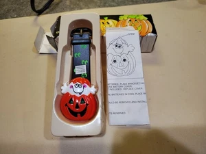 VINTAGE SCHMUCK AVON GRUSELIGE MELODIEN LEUCHTENDES MUSIKALISCHES ARMBAND KÜRBIS GEIST NOS - Bild 1 von 5