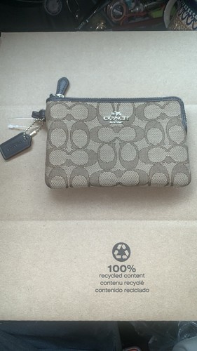 Bracciale Coach in pelle firmato in tela