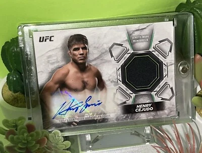 2018 Topps UFC Knockout Relics /199 Henry Cejudo #KAR-HC Auto thick CARD + MAG - Image 1 of 2