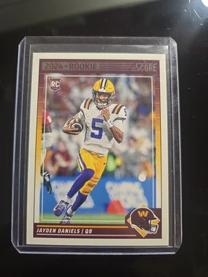 2024 Score Base Rookies Jayden Daniels #302  (RC) - Image 1 of 2