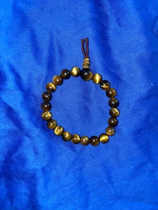 ^BRACELET BROWN WOOD LIKE BEADS ON STRETCHY BROWN THREAD    NNT - Picture 1 of 5
