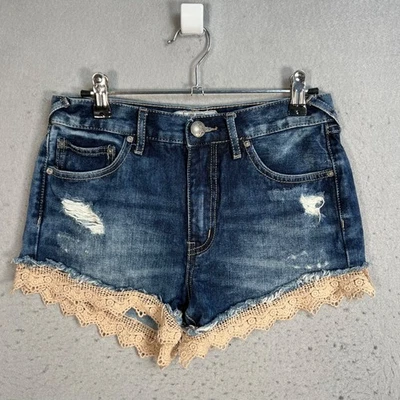 Pantalones cortos de mezclilla Free People para mujer azules desgastados talla 25 con ribete de encaje Foto 1 de 4